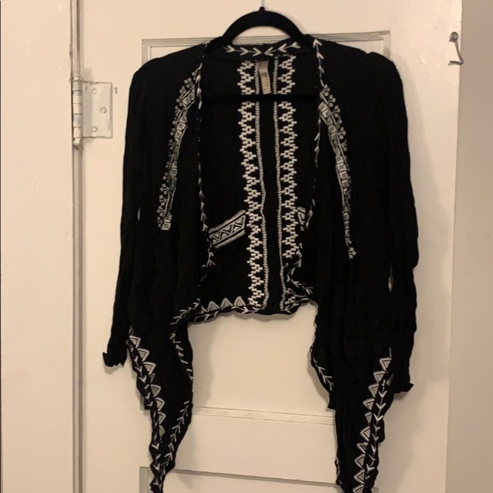 Black cardigan with stitched white detail